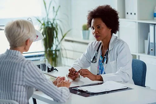 Doctor consulting patient