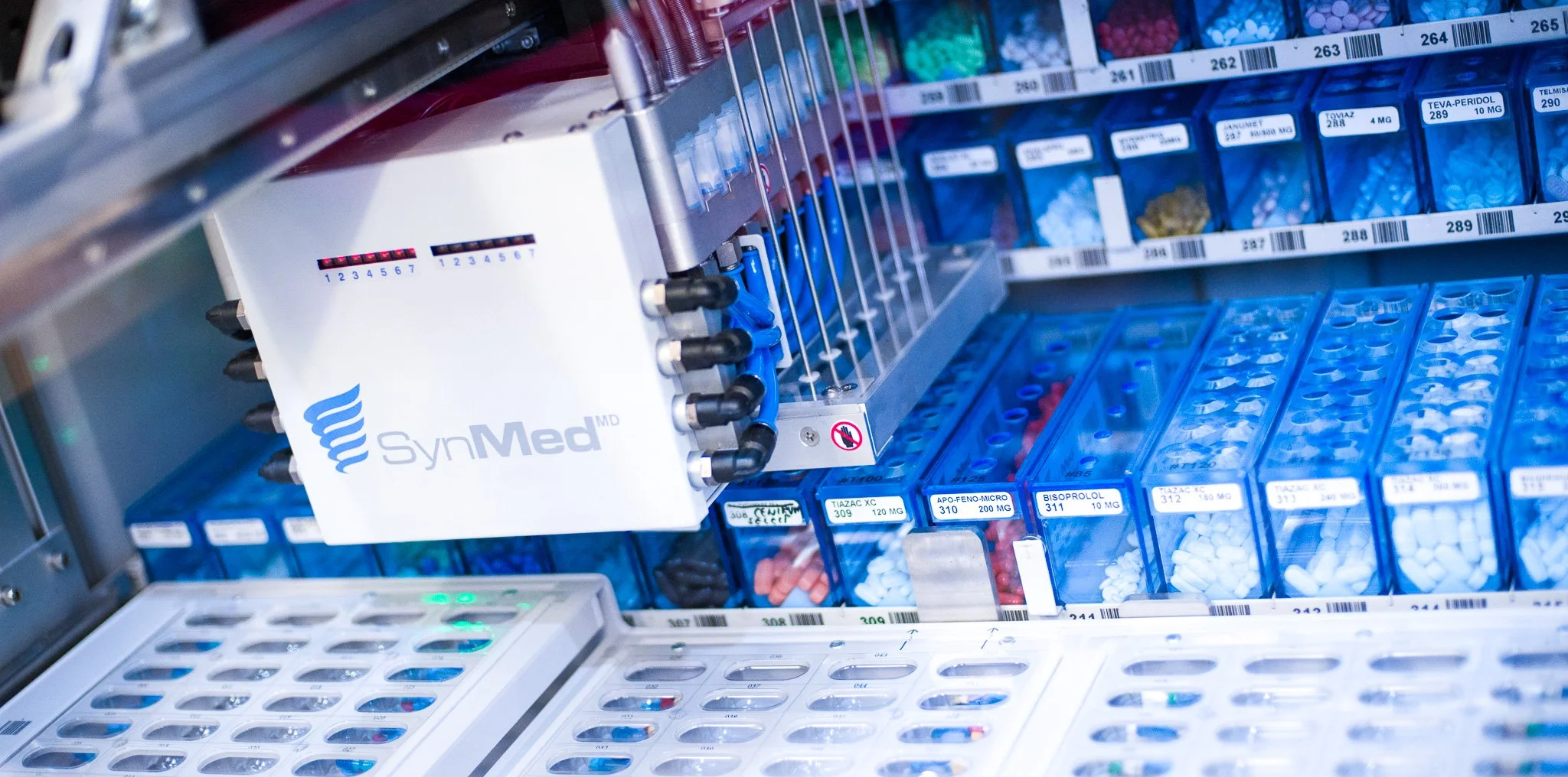 Pharmacy automation saves time filling medications.